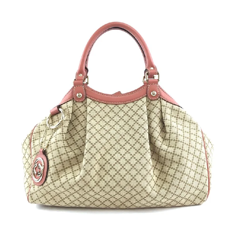 Women Gucci backpacks with a luxurious leather finishGucci Sukey Hobo Gg Diamante Tote Leather Brown and Orange Canvas Shoulder Bag