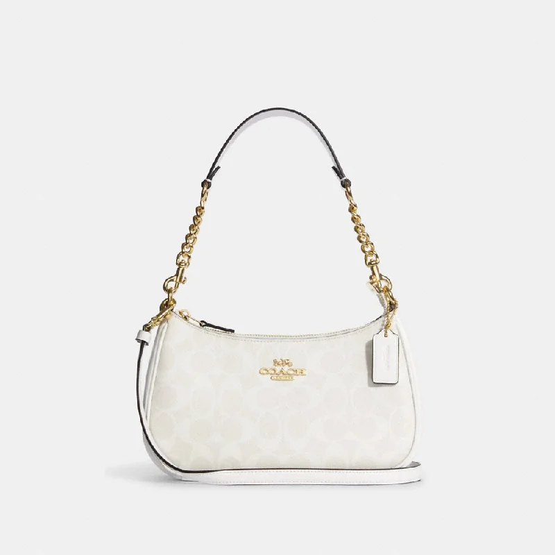 Coach Borough bags with a contrast - stitched handle for a unique lookCoach Teri Shoulder Bag In Signature Canvas in Chalk/Glacierwhite