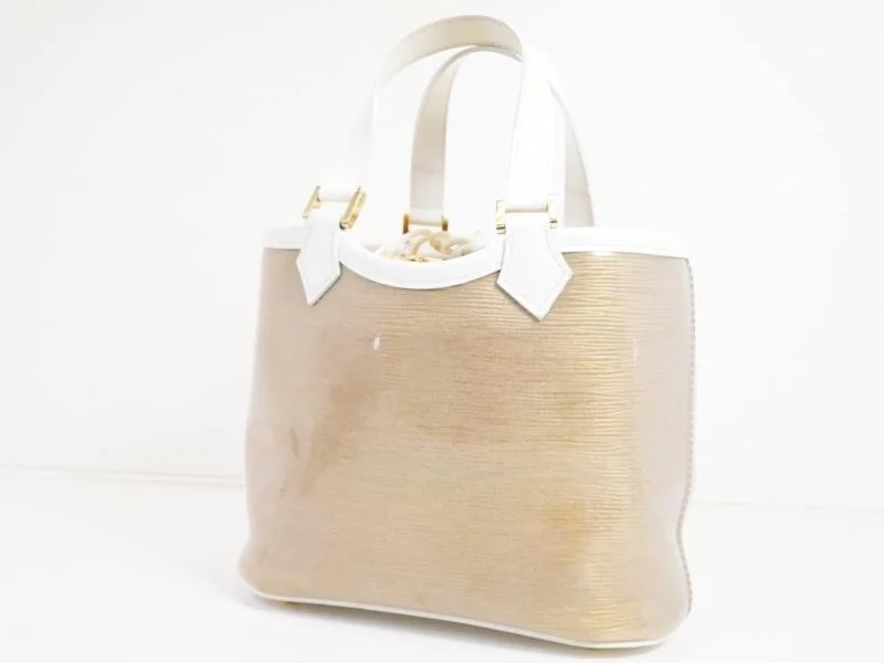 Louis Vuitton backpacks with a padded laptop compartment for travelAuthentic Pre-owned Louis Vuitton Epi Plage Coconut White Mini Lagoon Bay Tote Bag M92473 191984