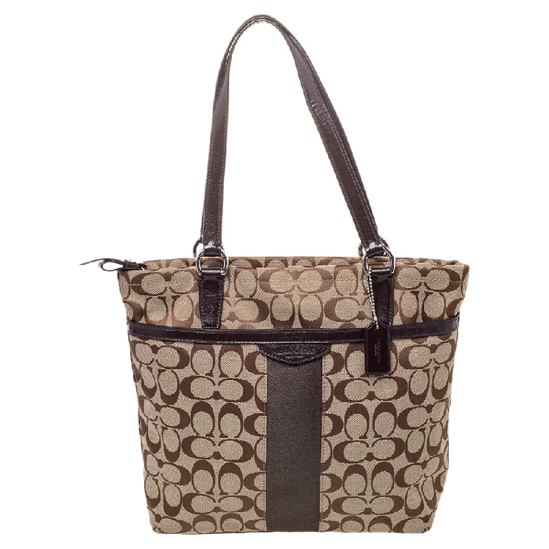 Coach Dempsey bags with a large capacity and a drawstring closureBrown /Beige Canvas And Patent Leather Top Zip Tote