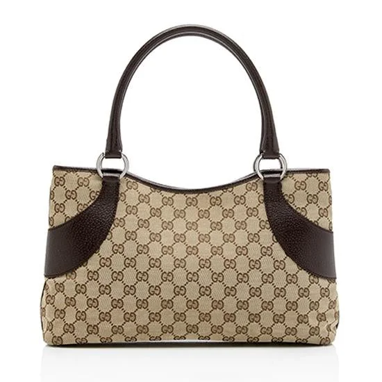 Women Gucci bags with a front - flap pocket for quick - access itemsGucci GG Canvas Tote