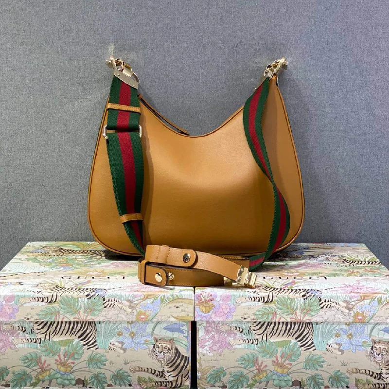 Women Gucci crossbody bags with a printed floral patternGucci Attache small shoulder bag Dark orange leather