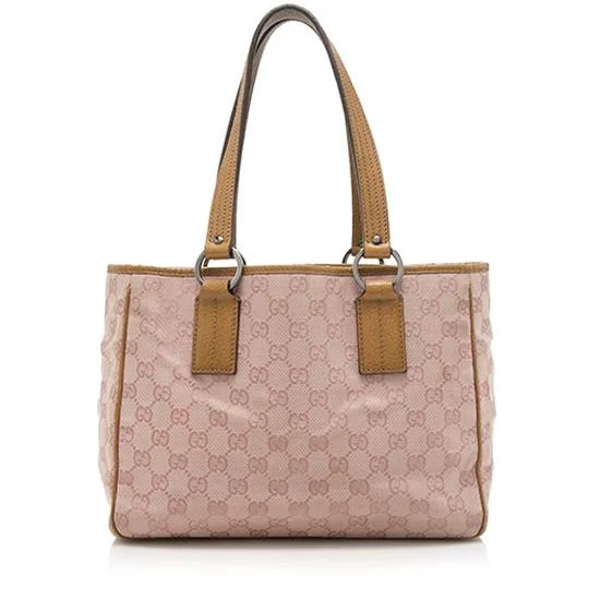 Women Gucci crossbody bags with a printed floral patternGucci GG Canvas Small Tote