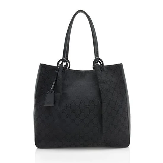 Gucci backpacks for women with a hidden back pocketGucci GG Canvas Leather Ring Large Tote