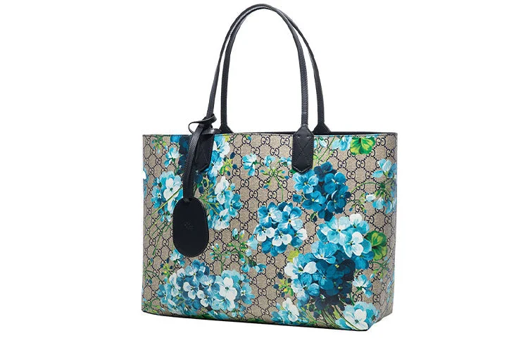 Women Gucci bags with a snap - button closure and a decorative charm(WMNS) GUCCI GG Blooms Logo Printing Canvas Tote Shoulder Bag Large Beige / Blue Handbag 546317-CU71X-8499