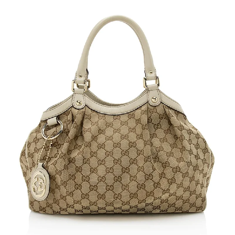 Women Gucci Sylvie bags with a monogram - embossed leatherGucci GG Canvas Sukey Medium Tote (SHF-12411)