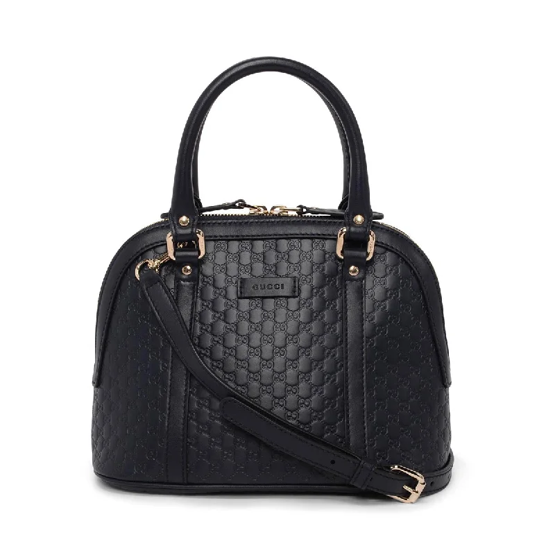 Gucci tote bags for women with a printed Gucci logoGucci Navy Microguccissima Mini Dome Bag