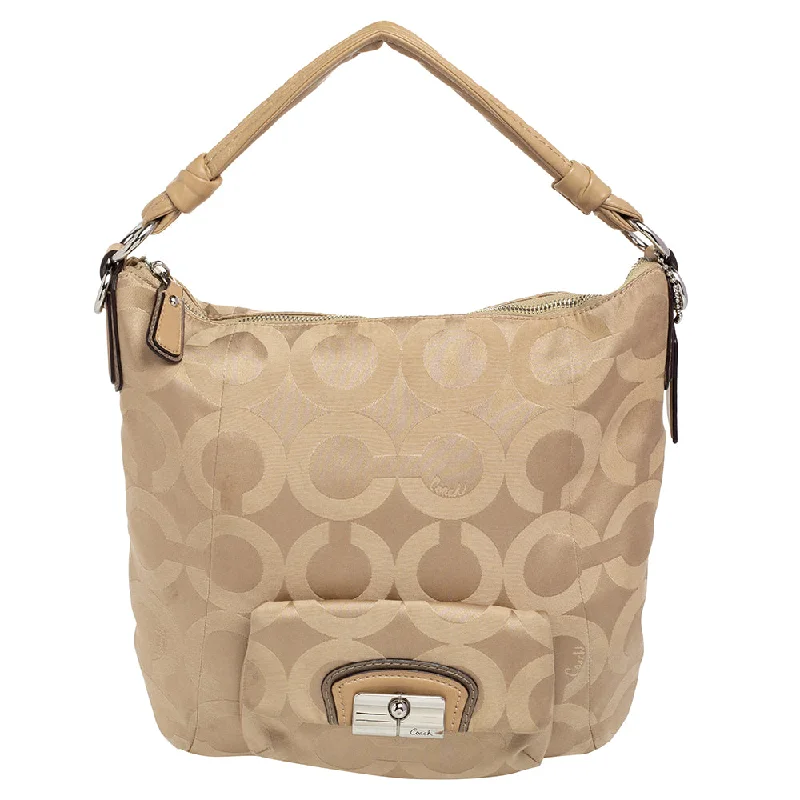 Coach Borough bags with a structured silhouette and a magnetic - snap closureBeige Signature Canvas And Leather Hobo