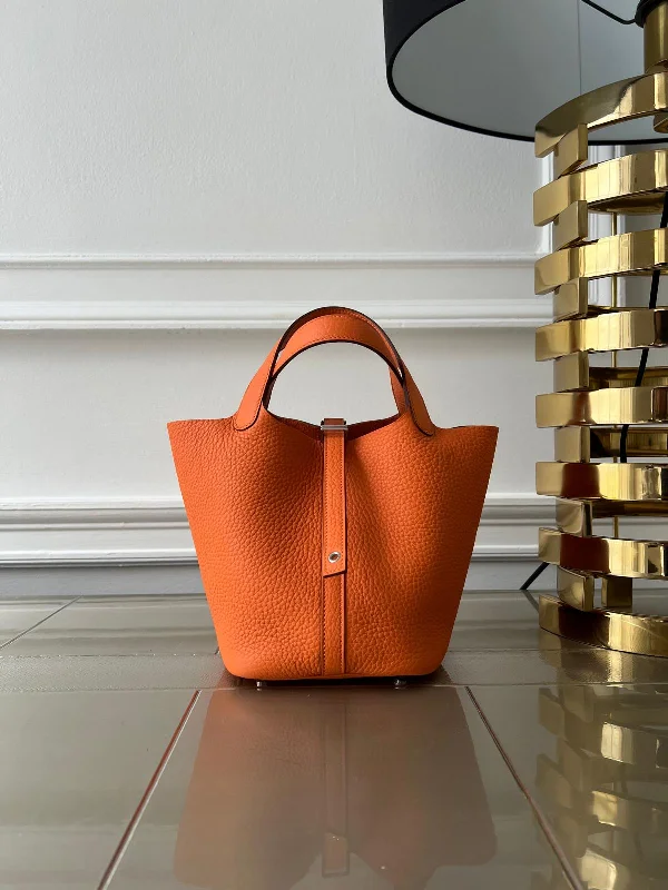 Hermes Bags with Magnetic and Twist - Lock ClosuresHERMÈS PICOTIN 18CM ORANGE Clemence Leather with Palladium Hardware