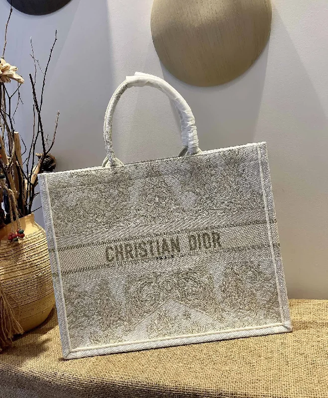 Christian Dior Saddle bags with a studded trim for a bold lookChristian Dior Book Tote Bag