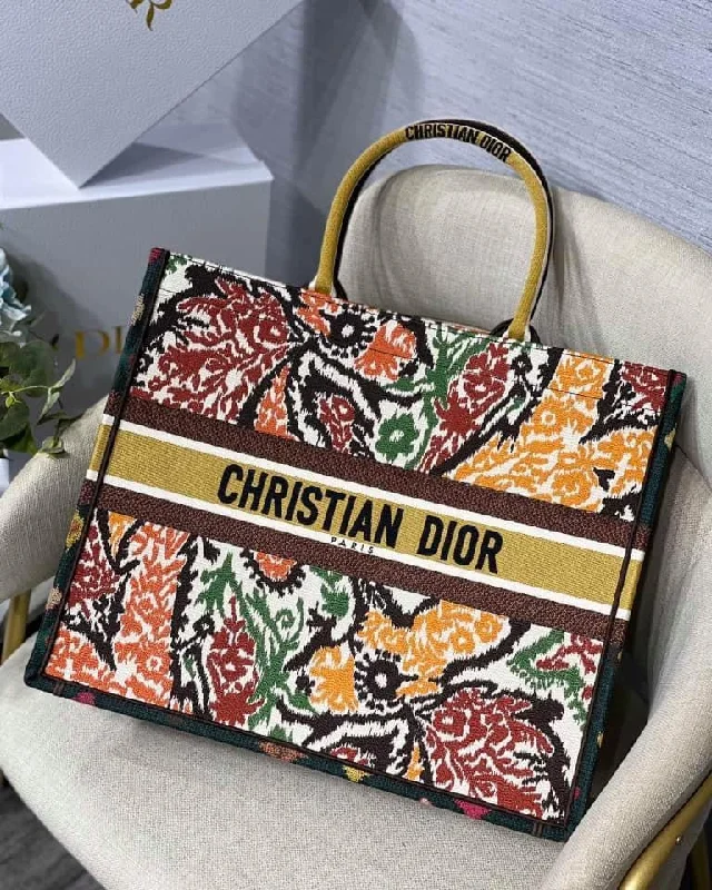 Christian Dior handbags with a snap - button closure and a decorative buckleChristian Dior Book Tote Bag