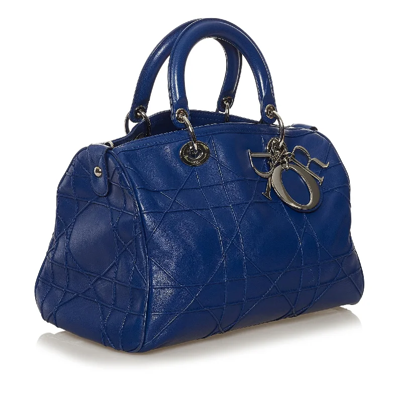 Christian Dior handbags with a snap - button closure and a decorative buckleDior Cannage Granville Polochon (34887)