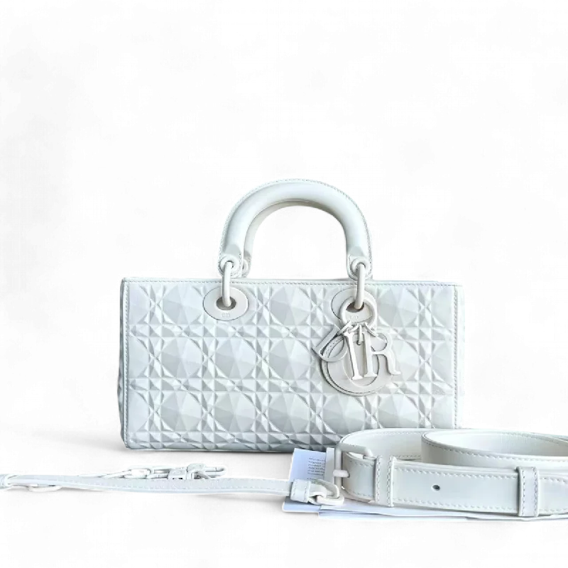 Christian Dior tote bags with a printed Dior logo on the frontDior D-Joy Medium Latte Cannage Calfskin Dimond Motif White