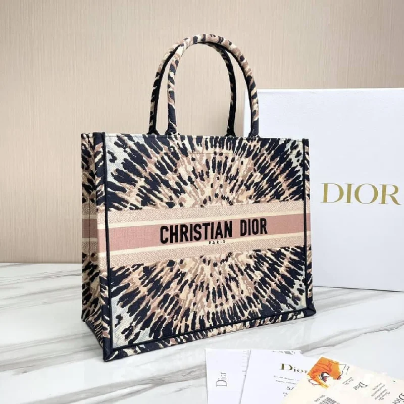 Christian Dior handbags with a snap - button closure and a decorative buckleChristian Dior Book Tote Bag